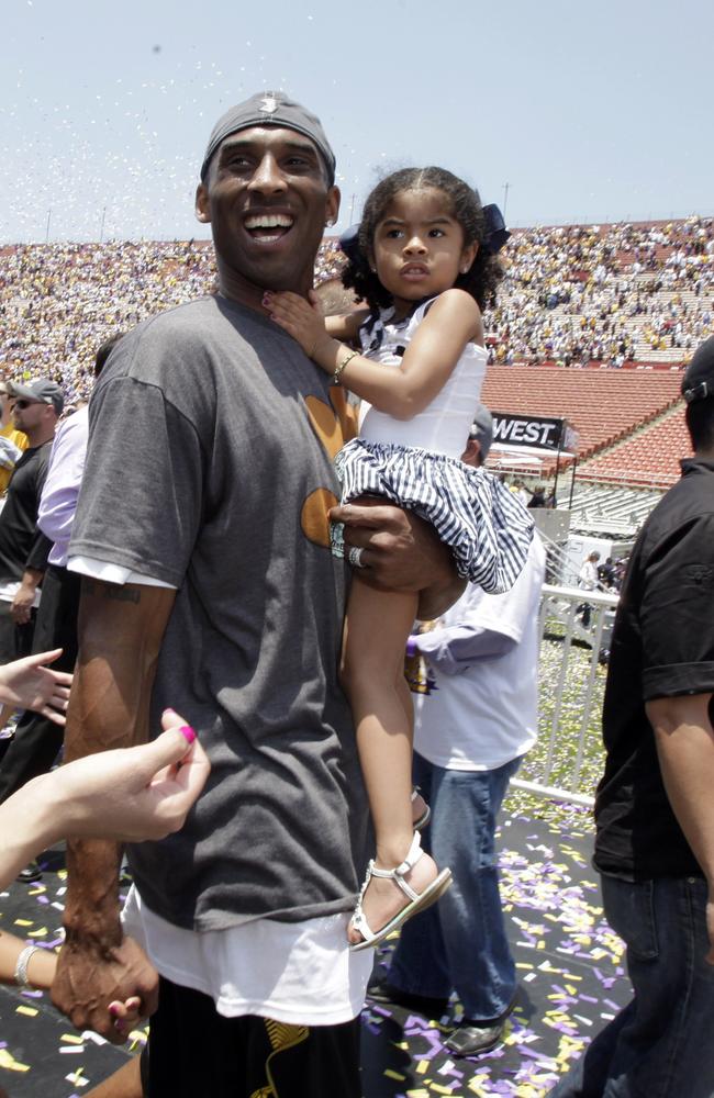 The 18-time NBA All-Star and his daughter Gigi at the 2009 NBA championship parade. Picture: Jae C Hong/AP