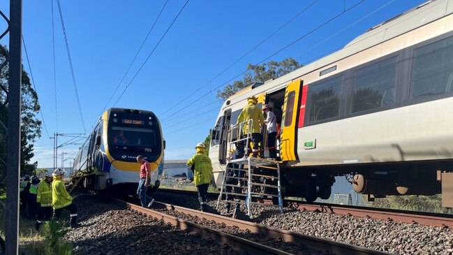 Emergency services on the scene after a train got stuck on the line near Yatala. Picture: QAS.