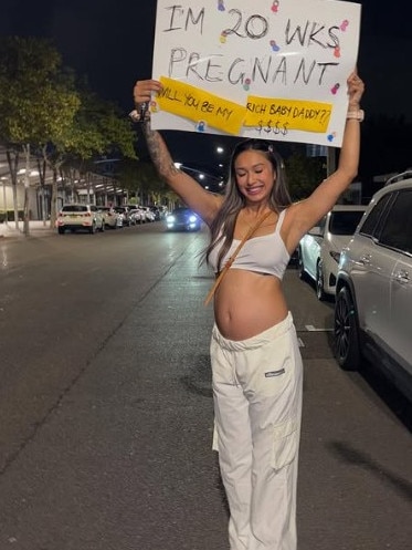 Ms Henderson posed with her sign outside. Picture: Instagram