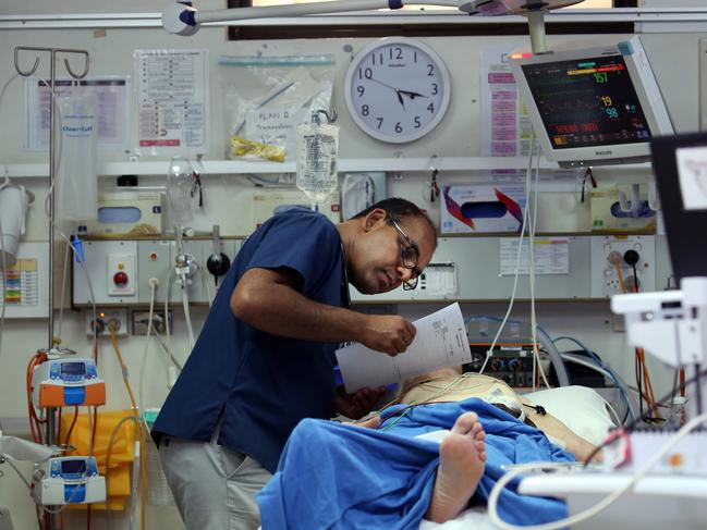 Dr Sateesh Kovurri treating another patient at the Cooma Hospital Emergency Department. Picture Gary Ramage