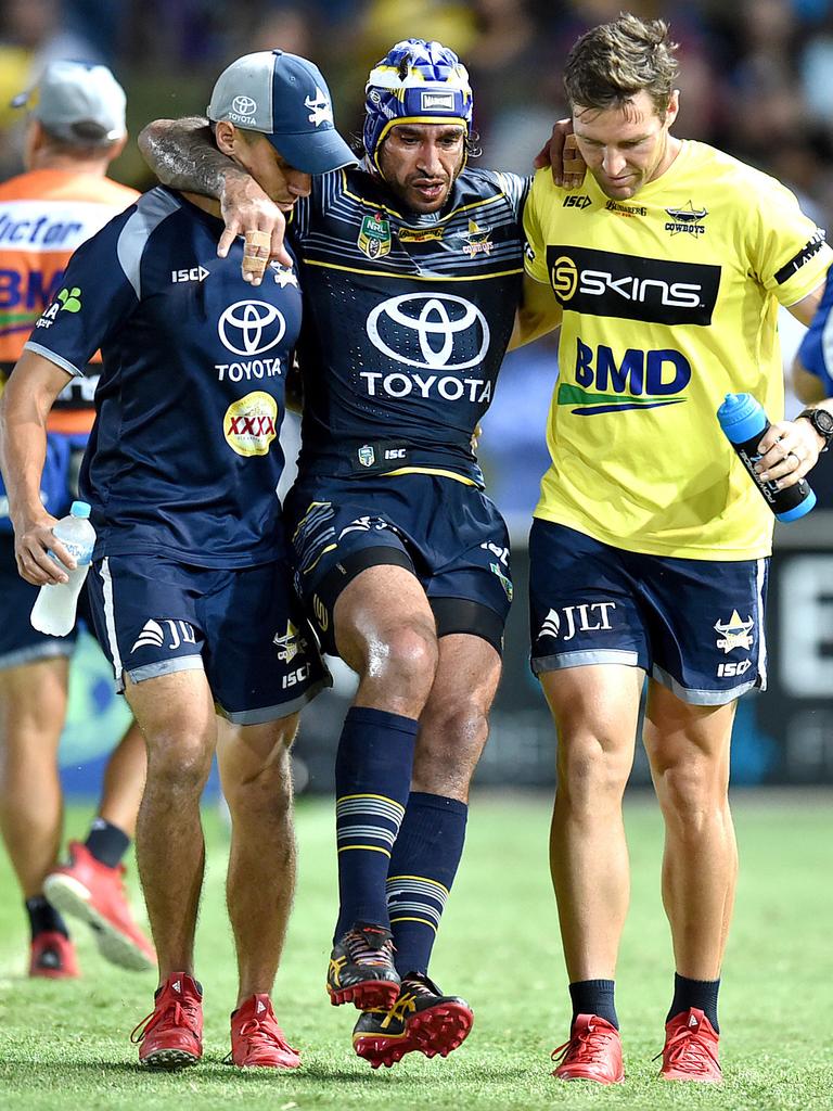 Johnathan Thurston limps off injured during a game against the West Tigers. Picture: Alix Sweeney, April 2017