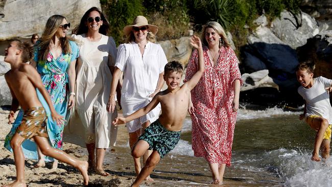 From left, West Australians Leisha Freebury, Olivia Lowe, Sarah Aitken and Paige Murphy with their children at Milk Beach in Sydney. Picture: Nikki Short