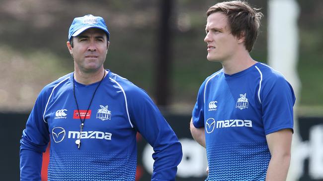 North Melbourne coach Brad Scott talks to Jared Polec. Picture: Michael Klein