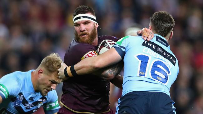 Josh McGuire takes on the Blues defence last season. Picture: Cameron Spencer/Getty Images