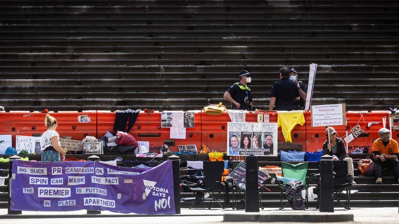 Protesters remained camped outside Parliament House in Melbourne throughout the debate. Picture: Sarah Matray / NCA NewsWire