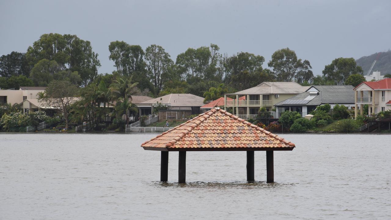 A gazebo gets completely inundated at Lake Orr, Varsity Lakes. Picture: Steve Holland