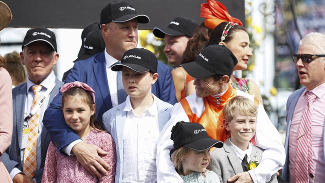 Danny O’Brien and Craig Williams shared their Cup success with their families at Flemington. Picture: Getty Images