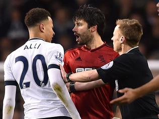 Tottenham Hotspur's English midfielder Dele Alli (2nd L) speaks with West Bromwich Albion's Argentinian midfielder Claudio Yacob (3rd R) following a challenge during the English Premier League football match between Tottenham Hotspur and West Bromwich Albion at White Hart Lane in London, on April 25, 2016. / AFP PHOTO / IKIMAGES / BEN STANSALL / RESTRICTED TO EDITORIAL USE. No use with unauthorized audio, video, data, fixture lists, club/league logos or 'live' services. Online in-match use limited to 45 images, no video emulation. No use in betting, games or single club/league/player publications.