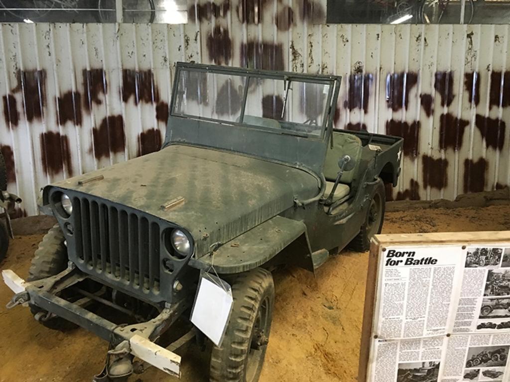 An old war truck is for sale.