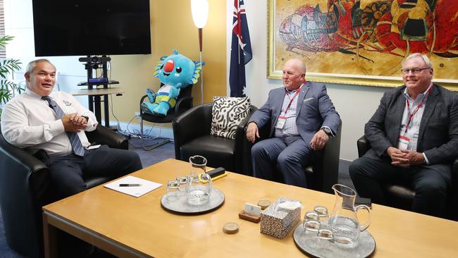 Commonwealth Games Australia CEO Craig Phillips (centre) and Commonwealth Games Federation Partners Director Michael Bushell (right) at the Council chambers and sitting down with Mayor Tom Tate to discuss the future of a Gold Coast Commonwealth Games in 2026. Picture: Glenn Hampson