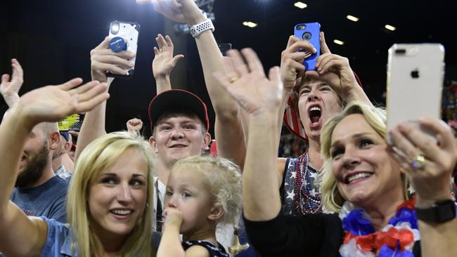 Supporters respond as President Trump arrives to speak at a rally in Montana. Picture: Susan Walsh/AP