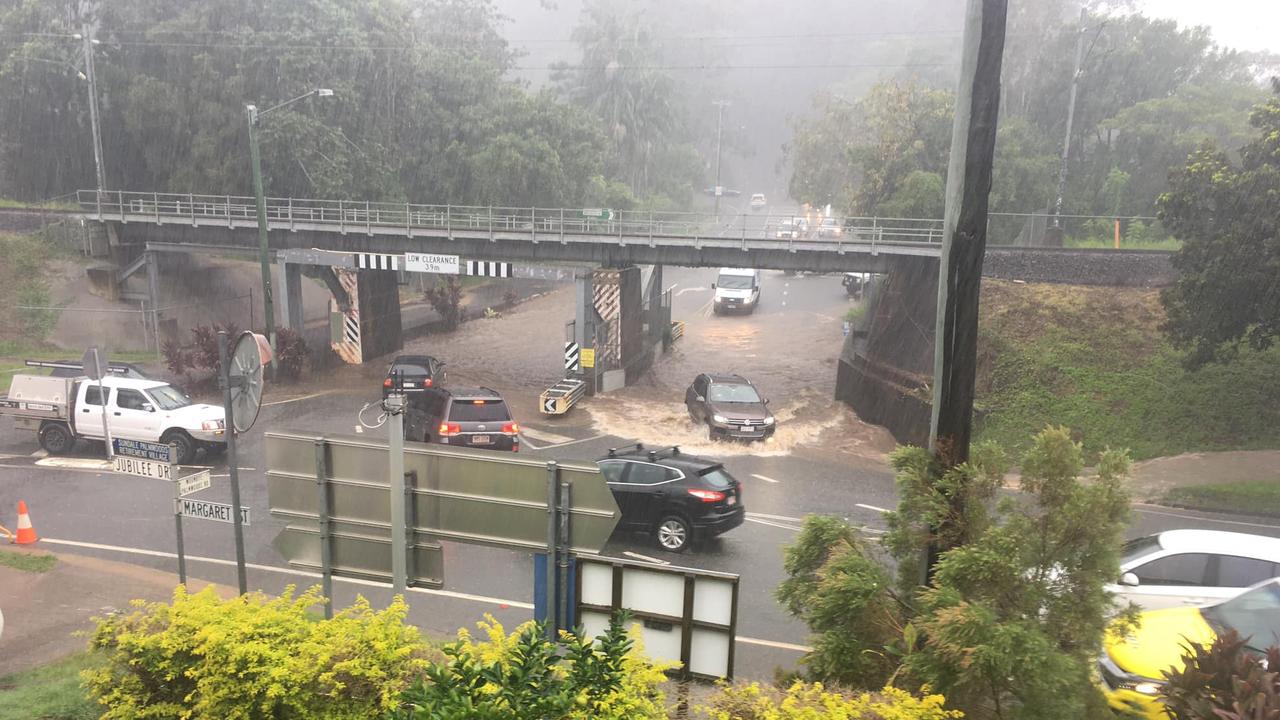 Flooding pictured at Palmwoods Railway Bridge around 2pm Friday. Picture: Dave Hughes