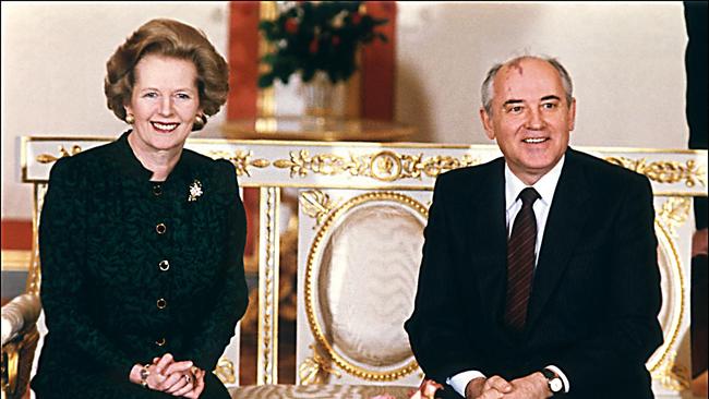 Margaret Thatcher poses with Mikhail Gorbachev at the start of talks at the Kremlin in Moscow.