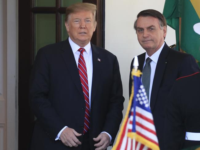 President Donald Trump welcomes visiting Brazilian President Jair Bolsonaro to the White House, Tuesday, March 19, 2019, in Washington. (AP Photo/Manuel Balce Ceneta)