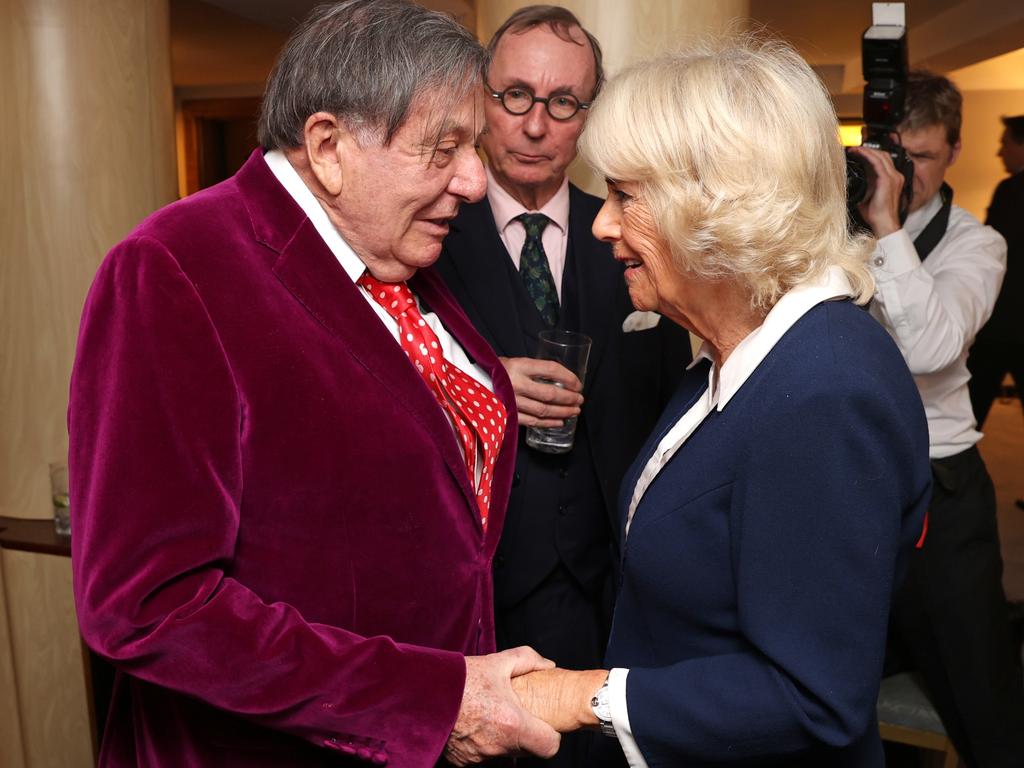 Barry Humphries was a favourite of the royal family. Pictured here with Camilla in London in 2021. Picture: Getty Images