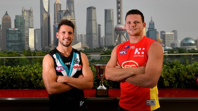 Port Adelaide Power captain Travis Boak and Gold Coast Suns co-captain Steven May overlooking the Shanghai skyline ahead of Saturday’s clash. Picture: AAP Image/David Mariuz