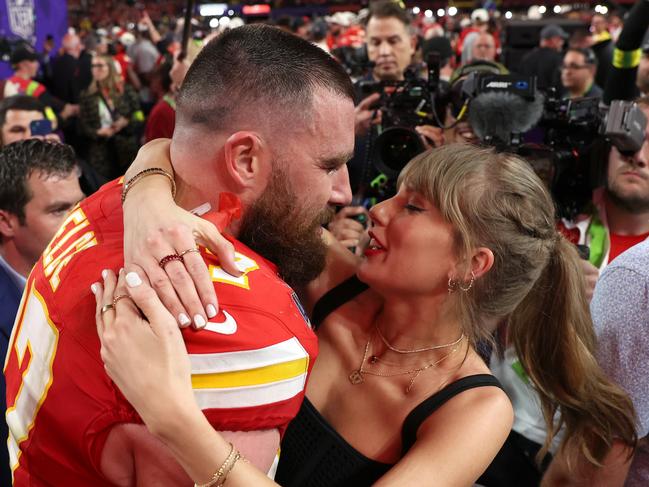 LAS VEGAS, NEVADA - FEBRUARY 11: Travis Kelce #87 of the Kansas City Chiefs kisses Taylor Swift after defeating the San Francisco 49ers 2 during Super Bowl LVIII at Allegiant Stadium on February 11, 2024 in Las Vegas, Nevada. (Photo by Ezra Shaw/Getty Images) *** BESTPIX ***