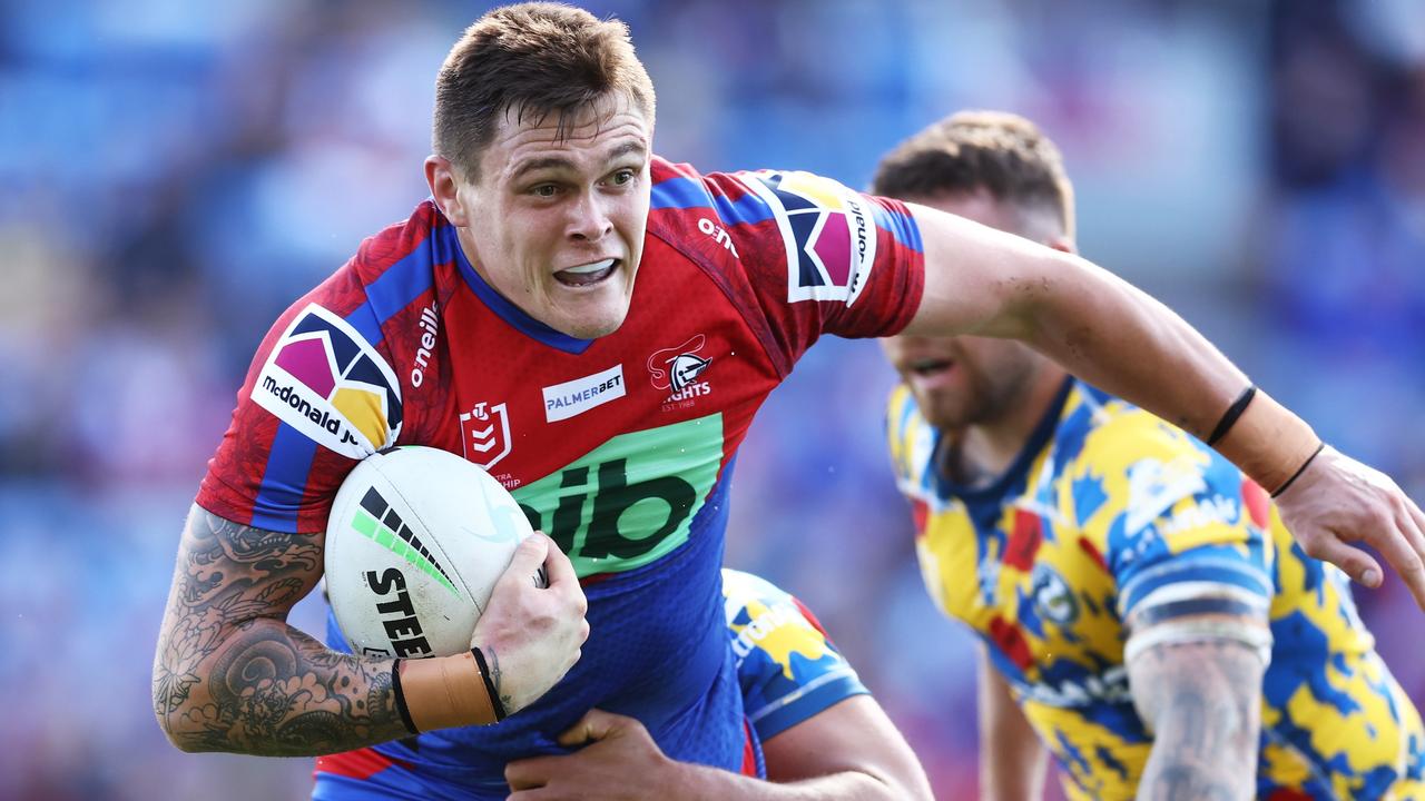 NEWCASTLE, AUSTRALIA - APRIL 24: Brodie Jones of the Knights is tackled during the round seven NRL match between the Newcastle Knights and the Parramatta Eels at McDonald Jones Stadium, on April 24, 2022, in Newcastle, Australia. (Photo by Matt King/Getty Images)