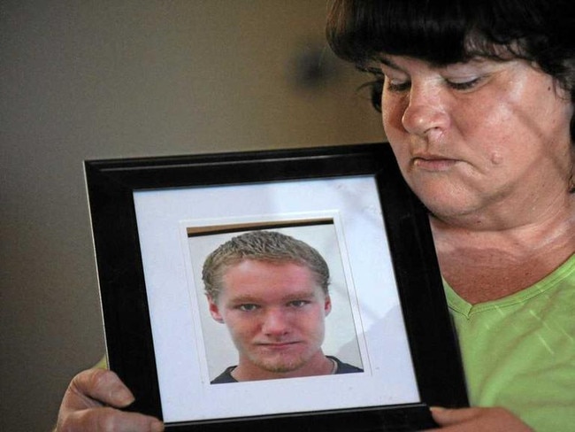 Helen Gordon with a portrait of her son Leonard Gordon who was murdered at the Maryborough Correctional Centre in 2012. Photo: Mike Knott / NewsMail. Picture: Mike Knott BUN071013ANN3