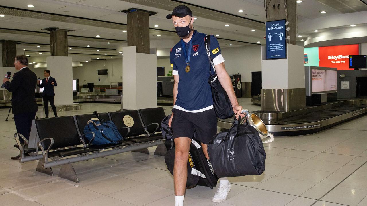 MELBOURNE, SEPTEMBER 30, 2021: AFL Premiership captain Max Gawn of the Melbourne Demons arrives home at Tullamarine Airport. Picture: Mark Stewart