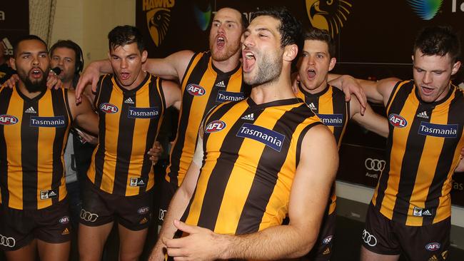 Hawthorn’s David Mirra enjoys the song after his debut. Picture: Michael Klein