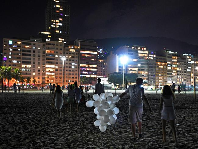 Revellers celebrate New Year's Eve at Copacabana beach, Rio de Janeiro, Brazil. Picture: AFP