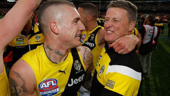 MELBOURNE, AUSTRALIA - SEPTEMBER 30: Dustin Martin of the Tigers and Damien Hardwick, Senior Coach of the Tigers celebrate during the 2017 Toyota AFL Grand Final match between the Adelaide Crows and the Richmond Tigers at the Melbourne Cricket Ground on September 30, 2017 in Melbourne, Australia. (Photo by Michael Willson/AFL Media/Getty Images)