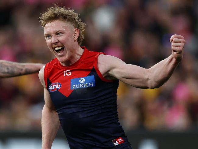 MELBOURNE, AUSTRALIA - August 20, 2023. AFL .  Clayton Oliver of the Demons celebrates a 4th quarter goal during the round 23 match between Melbourne and Hawthorn the MCG in Melbourne, Australia.  Photo by Michael Klein.