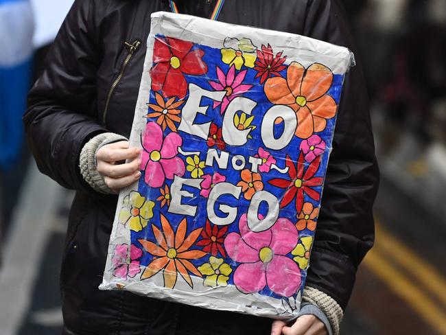 Saying it with flowers on the streets of Glasgow during COP26. Picture: AFP