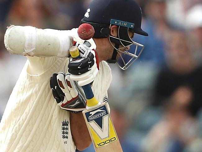 PERTH, AUSTRALIA - DECEMBER 18: James Anderson of England is stuck by a delivery from Pat Cummins of Australia  during day five of the Third Test match during the 2017/18 Ashes Series between Australia and England at WACA on December 18, 2017 in Perth, Australia.  (Photo by Ryan Pierse/Getty Images)