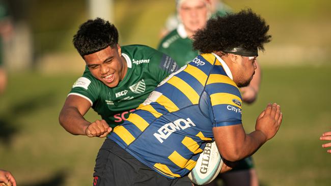 Uni player Nafetalai Tuipulotu is hard to stop.
