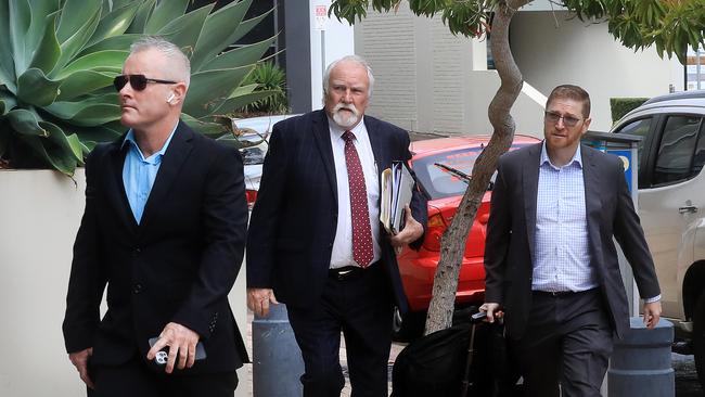 Jayden Moorea, formerly known as Dan Shearin, at Southport Courthouse with his defence team. Photo Scott Powick.