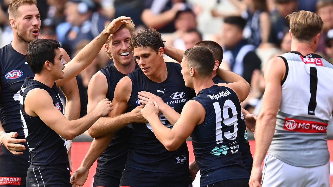 Charlie Curnow is congratulated after kicking a goal at the MCG. Picture: Getty Images