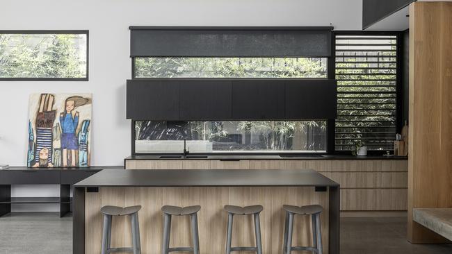 A modern kitchen with wooden accents.