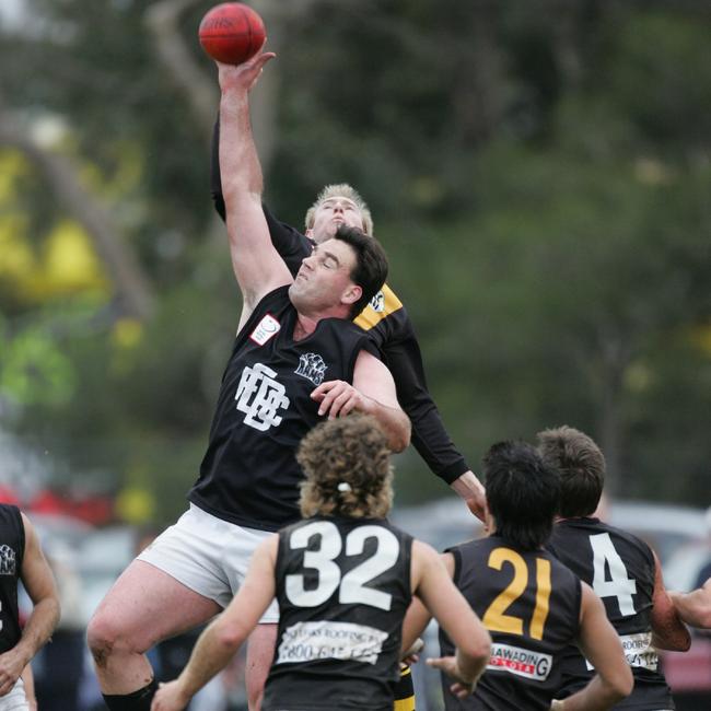 The indomitable Adam Slater wins another ruck contest. Picture: Garry Sparke