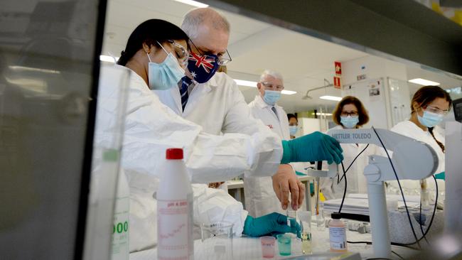 Scott Morrison meets CSL staff working on the COVID vaccine in Melbourne. ‘One of the single smartest things any Australian government has ever done was to convince CSL to become a domestic vaccine manufacturer’, Greg Sheridan writes. Picture: NCA NewsWire/Andrew Henshaw