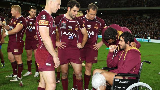 The Maroons team celebrate with the shield after winning game three of 2011.