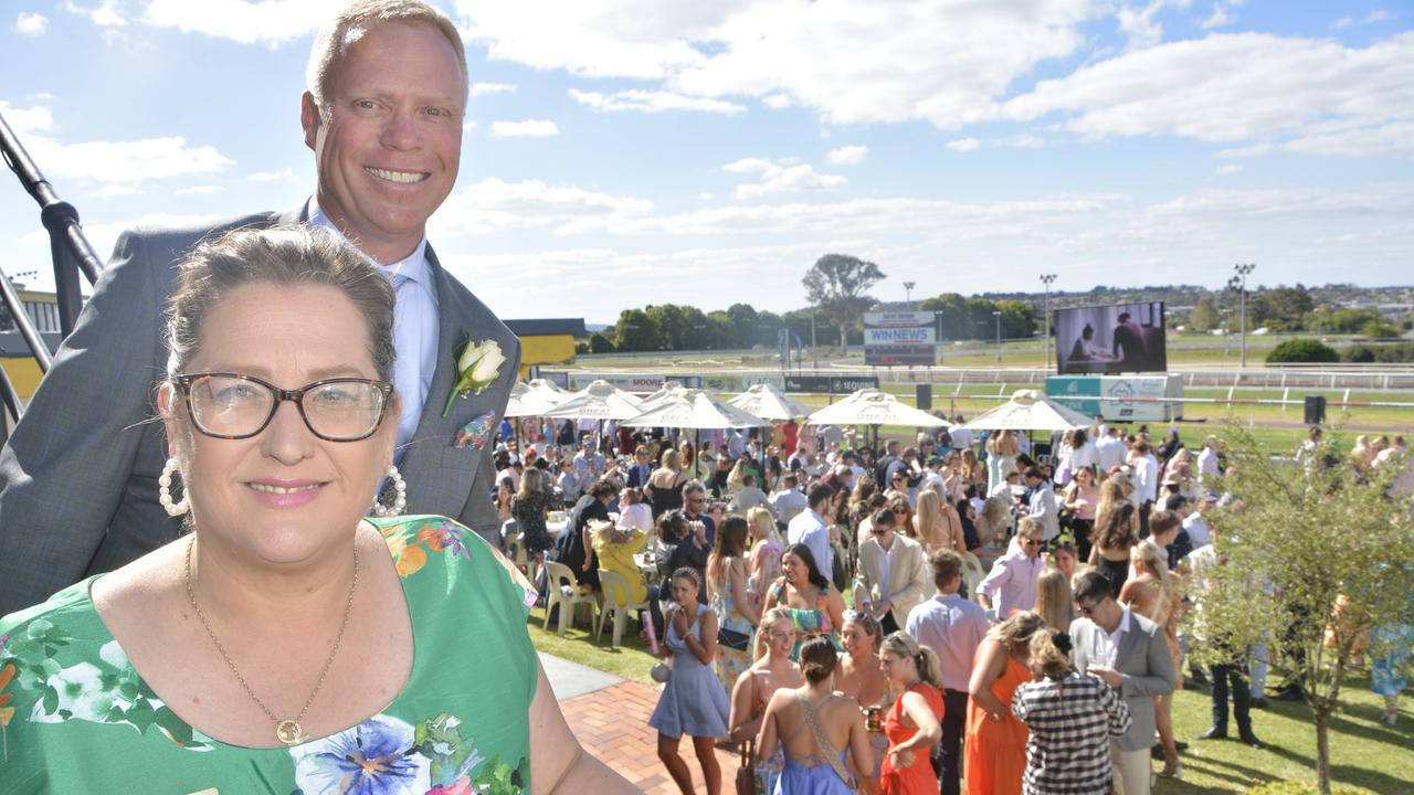 Toowoomba Turf Club CEO Lizzy King and chairman Jason Ward survey the crowd at the 2023 Audi Centre Toowoomba Weetwood race day at Clifford Park Racecourse.