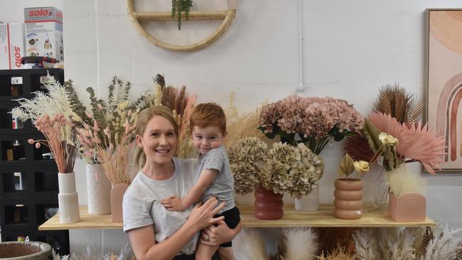 Renee Lavender with her son Hudson at her new store in Mackay, 2021. Picture: Matthew Forrest