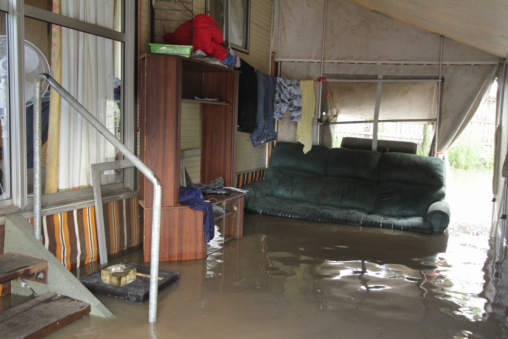 The Mary River slowly floods another residence in the Wallace Caravan Park where a number of elderly and disabled people live. Photo: Robyne Cuerel / Fraser Coast Chronicle. Picture: Robyne Cuerel