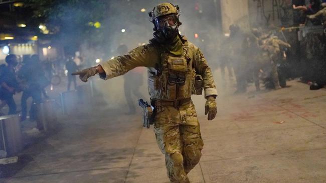 A federal officer dressed in camouflage. Picture: Nathan Howard/Getty Images/AFP