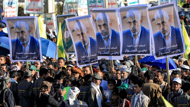 Supporters of Yemen's Houthis gather with pictures of Hamas slain leader Yahya Sinwar during a rally held on Friday in the Houthi-controlled capital Sanaa. Picture: Mohammed Huwais / AFP