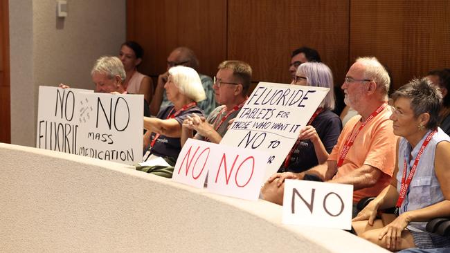 Dozens of anti-fluoride protesters attended the ordinary council meeting in Cairns on Wednesday. Picture: Brendan Radke