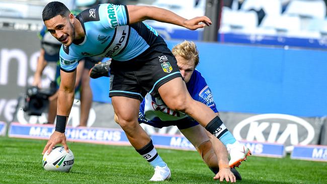 Valentine Holmes scores a try for the Sharks. Picture: AAP