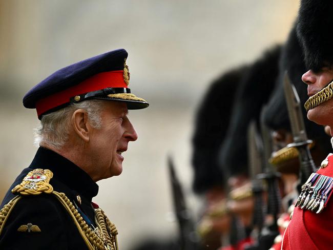 King Charles III speaks to soldiers as he reviews the Irish Guards during a ceremony where he presents New Colours. Picture: AFP