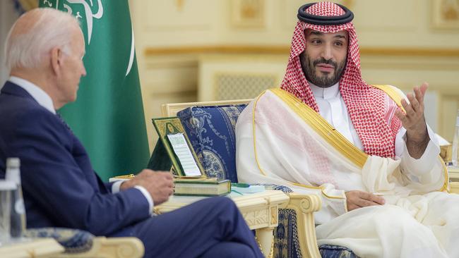 Saudi Crown Prince Mohammed bin Salman talks with Joe Biden at Al-Salam Palace. Picture: AFP