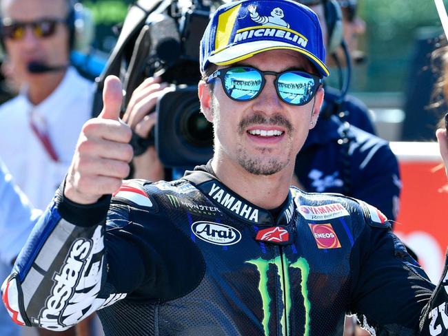 French MotoGP rider Maverick Vinales celebrates after setting the pole position for Sunday's San Marino Motorycling Grand Prix, at the Misano circuit in Misano Adriatico, Italy, Saturday, Sept. 14, 2019. (Alessio Marini/ANSA via AP)