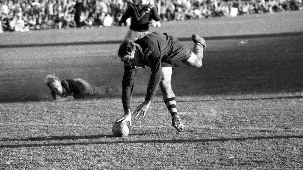 Johnny Raper scores a try during the second rugby league Test between Australia and the British Lions at the Brisbane Exhibition Ground in 1959.