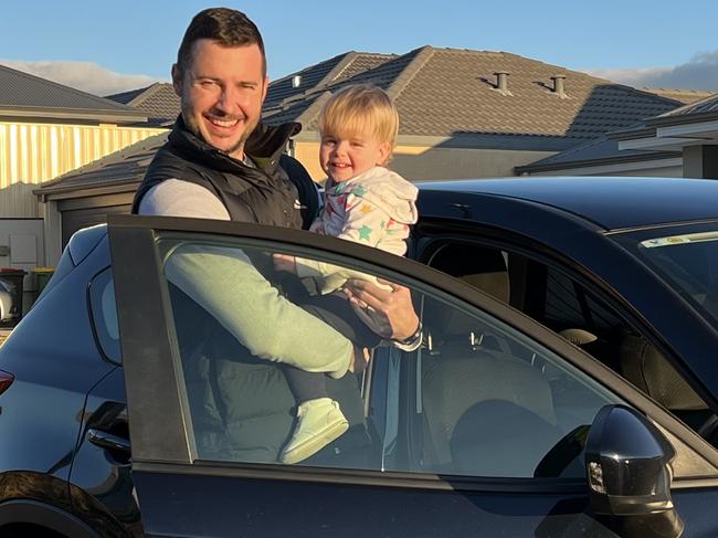 Liam Gayner with his almost two-year-old daughter Isabelle. Mr Gayner says he is now saving more than 50 per cent on his car insurance. Picture: Supplied