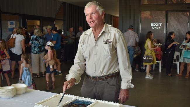 Roma Citizen of the Year Ken Beitz cutting the cake at the conclusion of the Maranoa Australia Day Awards 2023. Picture: Chloe Cufflin.